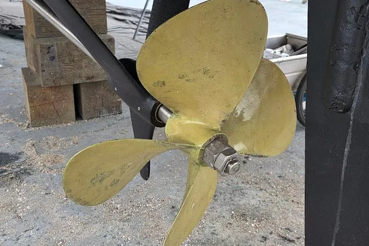 Slide: The Image of Propeller of 1993 McKinna 48 Pilothouse boat on dry dock. - 118