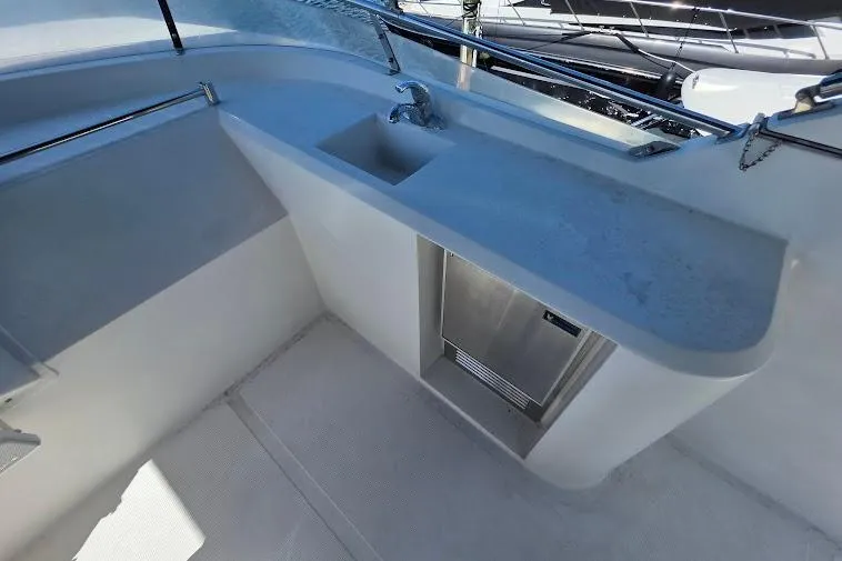 Slide: The Image of Outdoor sink and counter on a 1993 McKinna 48 Pilothouse yacht. - 82