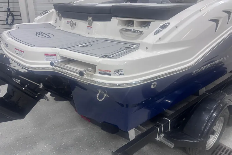 Slide: The Image of 2026 Chaparral 21 SSi boat rear view, featuring sleek design and modern features. - 14