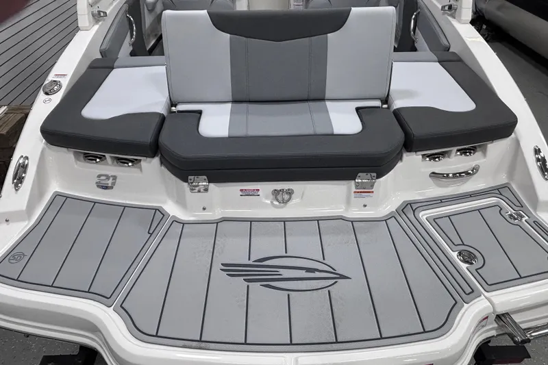Slide: The Image of 2026 Chaparral 21 SSi boat with sleek gray seating and deck design. - 20