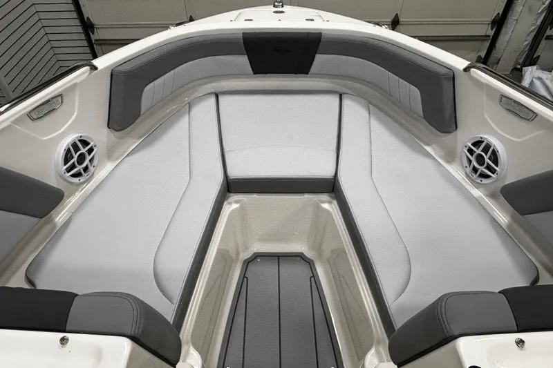 Slide: The Image of 2026 Chaparral 21 SSi boat interior with gray seating and speakers. - 25