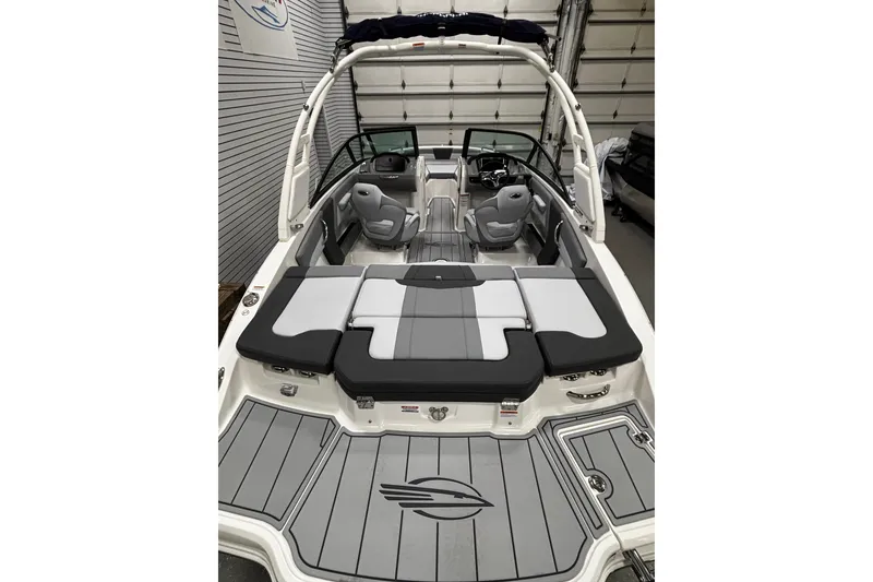 Slide: The Image of 2026 Chaparral 21 SSi boat interior with gray seating and sleek design. - 36