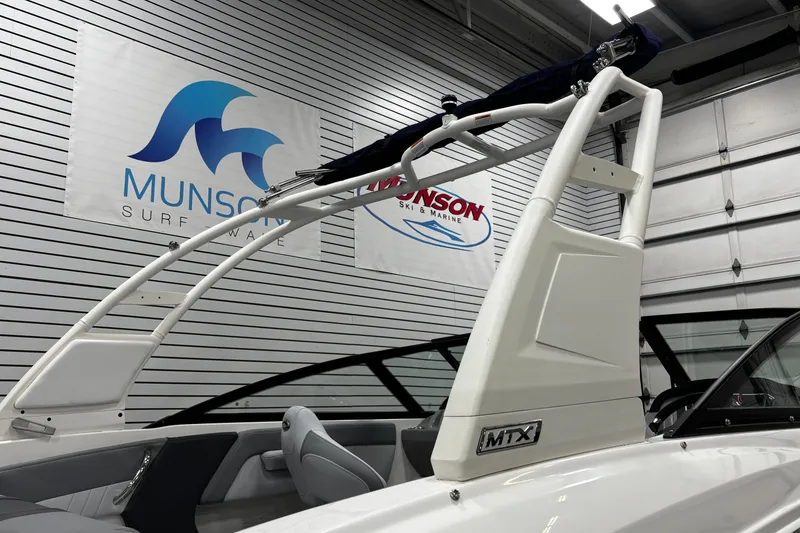 Slide: The Image of 2026 Chaparral 21 SSi boat with MTX tower in showroom setting. - 37