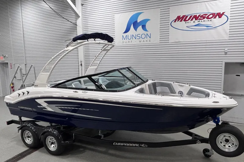 Slide: The Image of 2026 Chaparral 21 SSi boat on trailer at Munson Ski & Marine showroom. - 8
