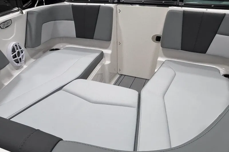 Slide: The Image of Interior seating of 2026 Chaparral 21 SSi boat, featuring gray and white upholstery. - 16