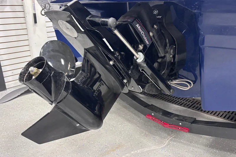 Slide: The Image of 2026 Chaparral 21 SSi boat with MerCruiser outdrive, close-up view. - 17