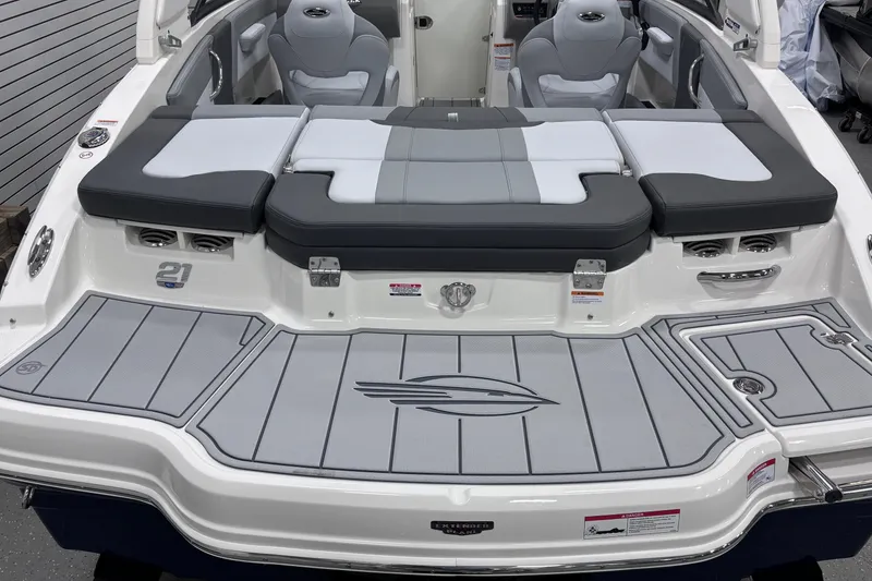 Slide: The Image of 2026 Chaparral 21 SSi boat with sleek seating and modern design. - 18