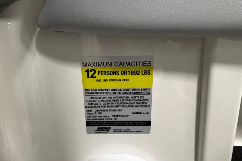 Slide: The Image of 2026 Chaparral 21 SSi capacity label: 12 persons or 1692 lbs, safety compliance. - 26