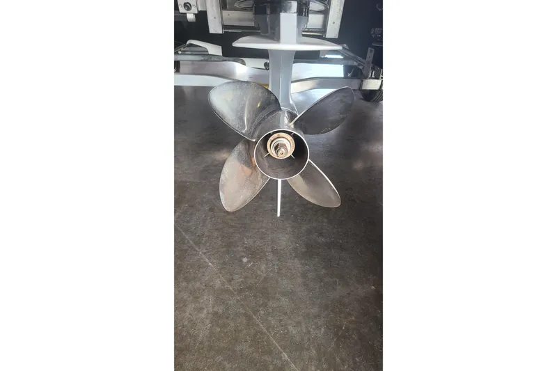 Slide: The Image of Propeller of a 2025 Paramount 21 boat on a concrete surface. - 27
