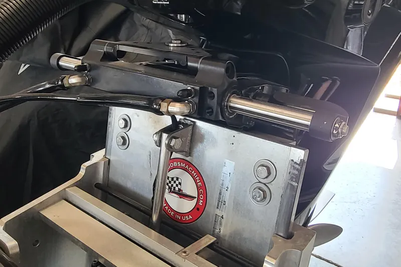 Slide: The Image of Close-up of a 2025 Paramount 21 boat engine component with hydraulic steering system. - 29