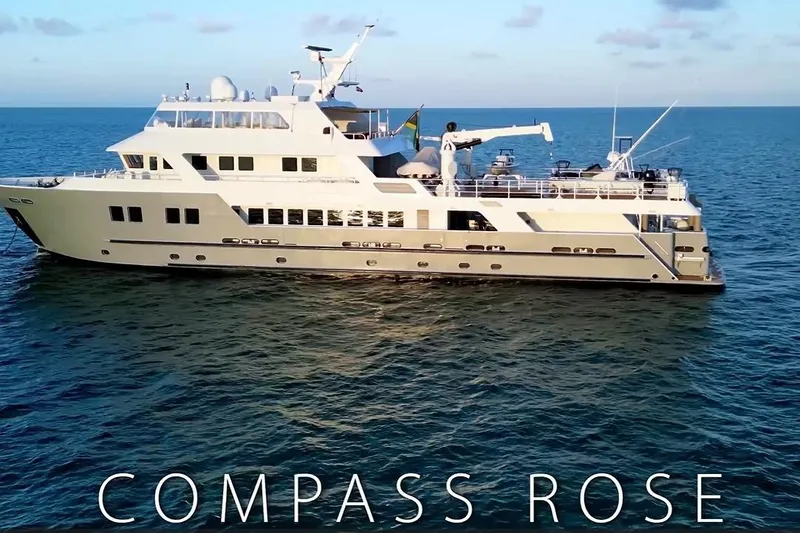 Slide: The Image of Luxury yacht "Compass Rose" by C & G Boatworks, Explorer model, 2011, cruising on open sea. - 2