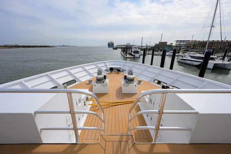 Slide: The Image of Bow view of 2011 C & G Boatworks Explorer yacht docked in a marina. - 24