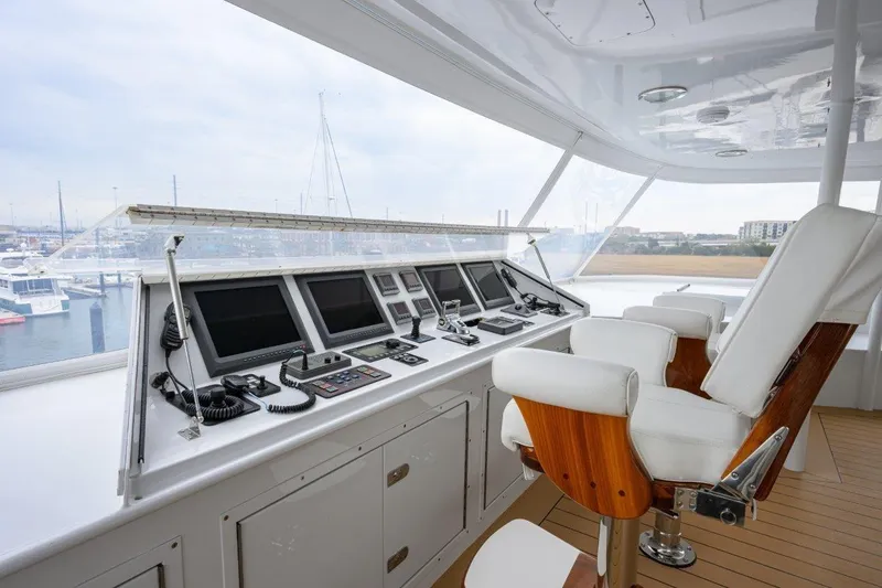 Slide: The Image of Luxurious helm of 2011 C & G Boatworks Explorer with advanced navigation systems. - 36