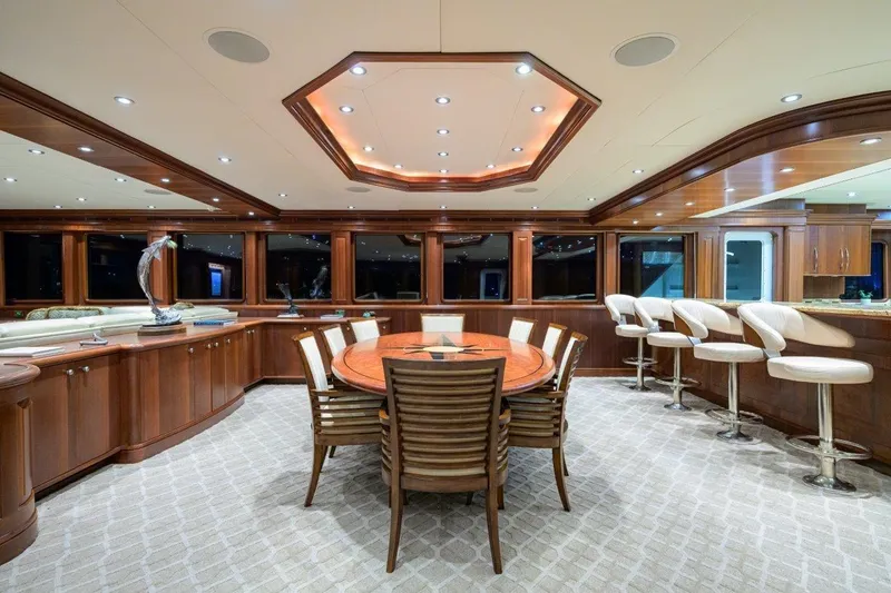 Slide: The Image of Luxurious interior of 2011 C & G Boatworks Explorer yacht with elegant dining and bar area. - 38