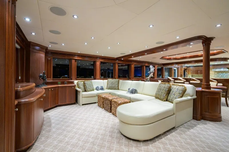 Slide: The Image of Luxurious interior of 2011 C & G Boatworks Explorer yacht with elegant seating and wood accents. - 40