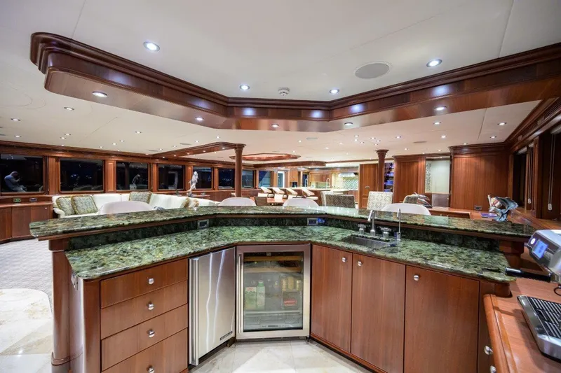 Slide: The Image of Luxurious interior of 2011 C & G Boatworks Explorer yacht with elegant wood and granite finishes. - 43