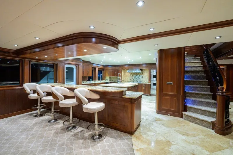 Slide: The Image of Luxurious 2011 C & G Boatworks Explorer yacht interior with elegant kitchen and bar seating. - 48