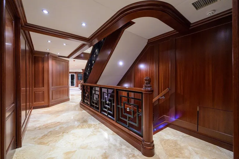 Slide: The Image of Luxurious interior of 2011 C & G Boatworks Explorer with elegant wood paneling and marble flooring. - 54