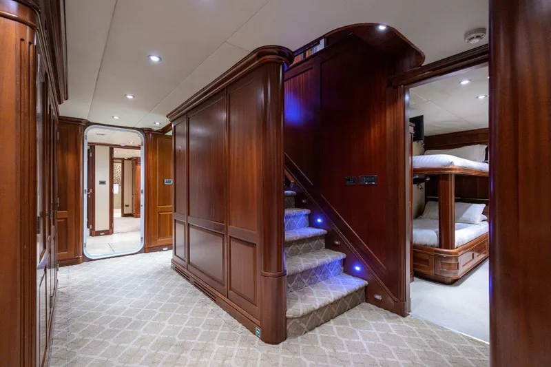 Slide: The Image of Luxurious interior of 2011 C & G Boatworks Explorer with wooden paneling and carpeted stairs. - 60