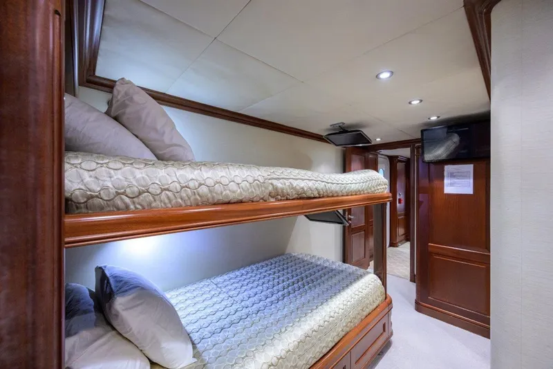Slide: The Image of Interior of 2011 C & G Boatworks Explorer with cozy bunk beds and elegant wood finish. - 65