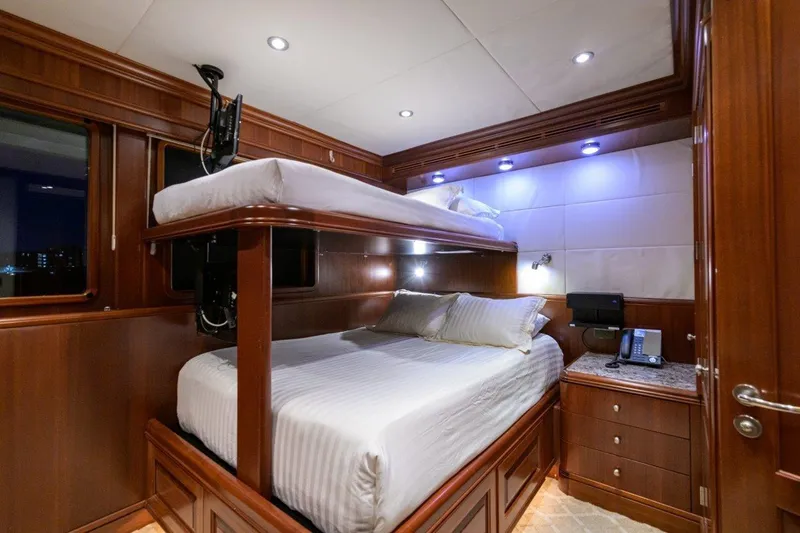 Slide: The Image of Luxurious 2011 C & G Boatworks Explorer cabin with wooden interior and bunk beds. - 68