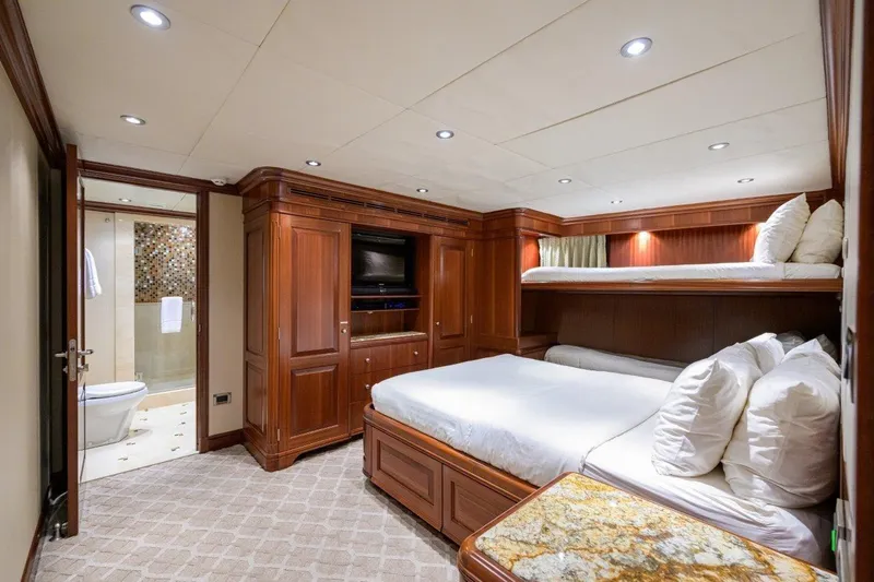 Slide: The Image of Luxurious 2011 C & G Boatworks Explorer cabin with wood paneling and ensuite bathroom. - 70