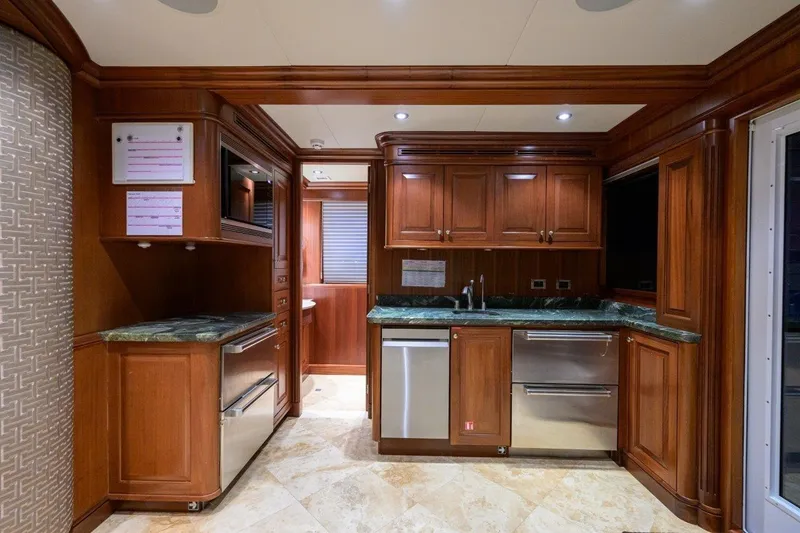 Slide: The Image of Luxurious wooden kitchen interior in 2011 C & G Boatworks Explorer yacht. - 76