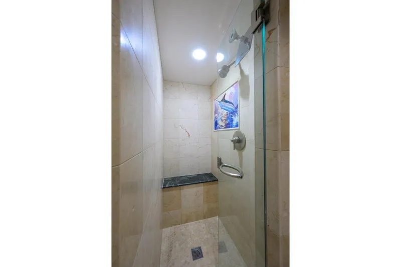 Slide: The Image of Luxurious shower in 2011 C & G Boatworks Explorer yacht, featuring elegant tile and modern fixtures. - 78