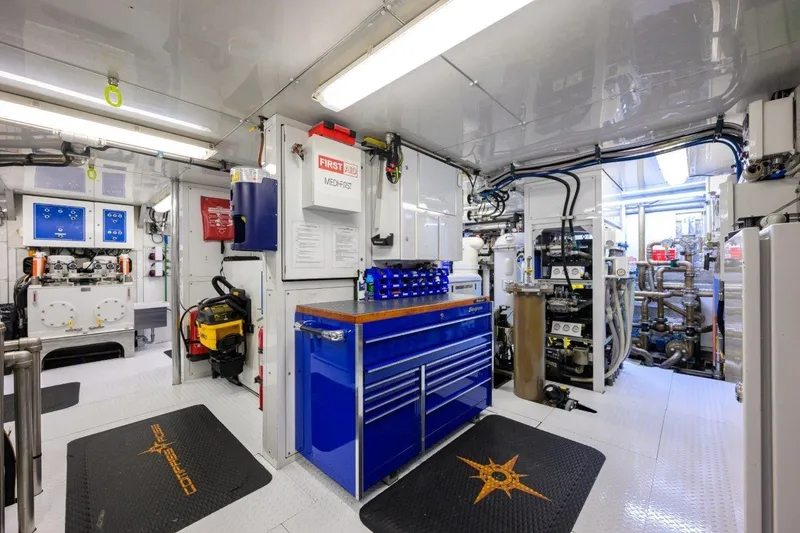 Slide: The Image of Engine room of 2011 C & G Boatworks Explorer, featuring equipment and storage. - 81