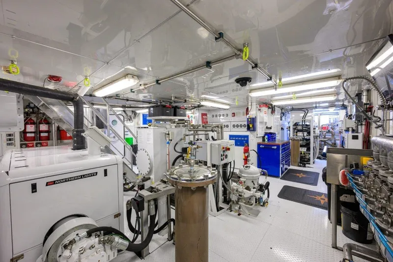 Slide: The Image of Engine room of 2011 C & G Boatworks Explorer, featuring advanced machinery and equipment. - 82