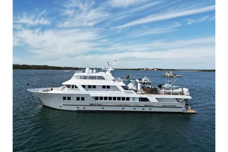 Slide: The Image of Luxurious 2011 C & G Boatworks Explorer yacht cruising on serene waters. - 88