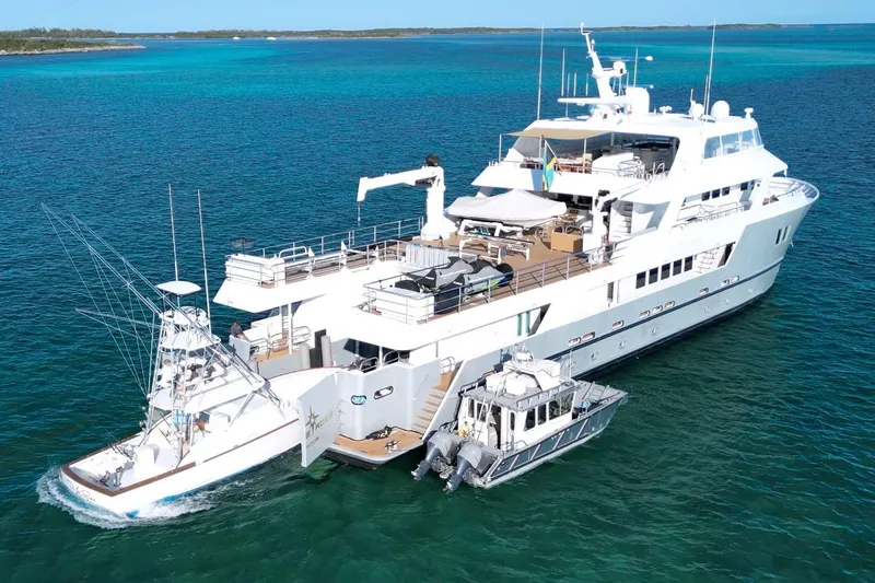 Slide: The Image of Luxury yacht "Explorer" by C & G Boatworks, 2011, anchored in clear blue waters. - 92