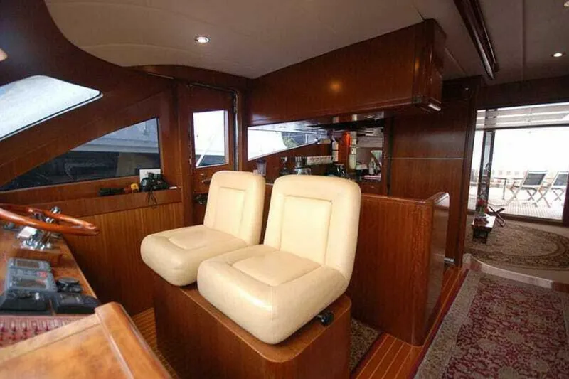 Slide: The Image of Luxurious interior of 2009 Grand Harbour 66 Motoryacht with plush seating and elegant wood finish. - 15