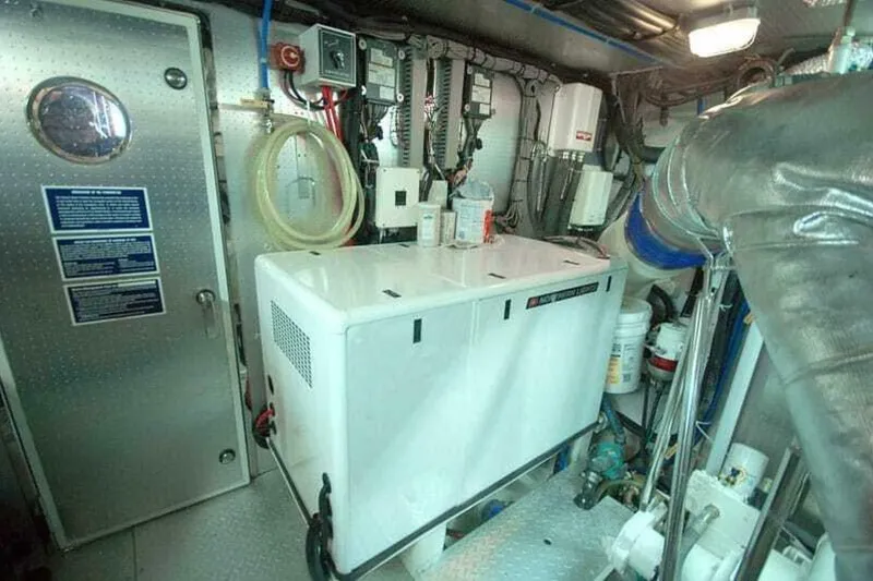 Slide: The Image of Engine room of 2009 Grand Harbour 66 Motoryacht with equipment and control panels. - 24