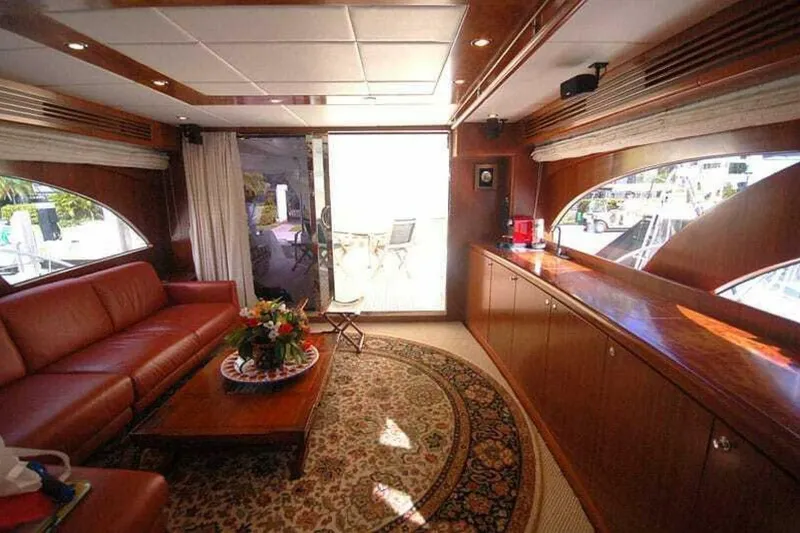 Slide: The Image of Luxurious interior of 2009 Grand Harbour 66 Motoryacht with elegant wood finishes and plush seating. - 31