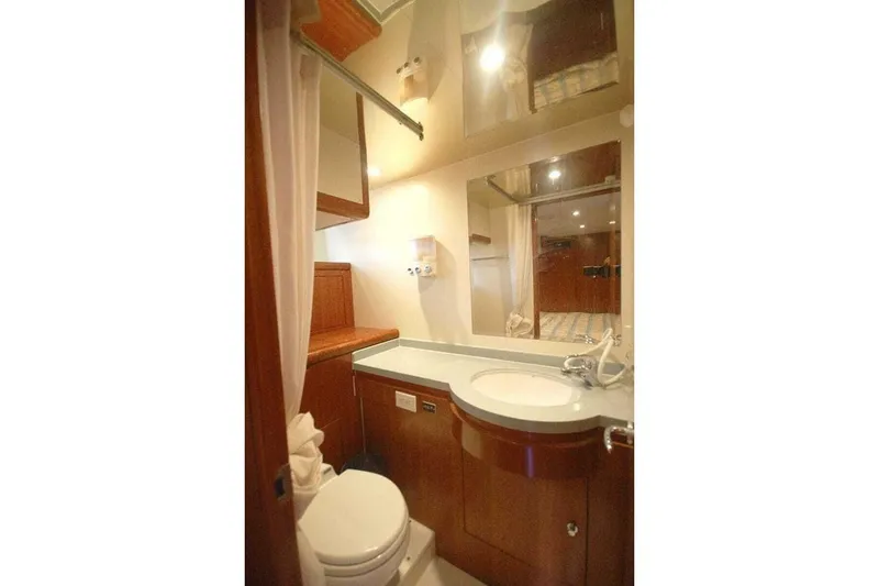 Slide: The Image of Luxurious bathroom in 2009 Grand Harbour 66 Motoryacht with elegant wood finishes. - 35