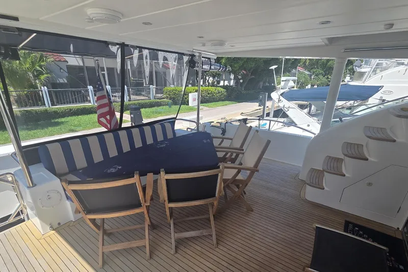 Slide: The Image of Spacious deck of 2009 Grand Harbour 66 Motoryacht with seating and table. - 37