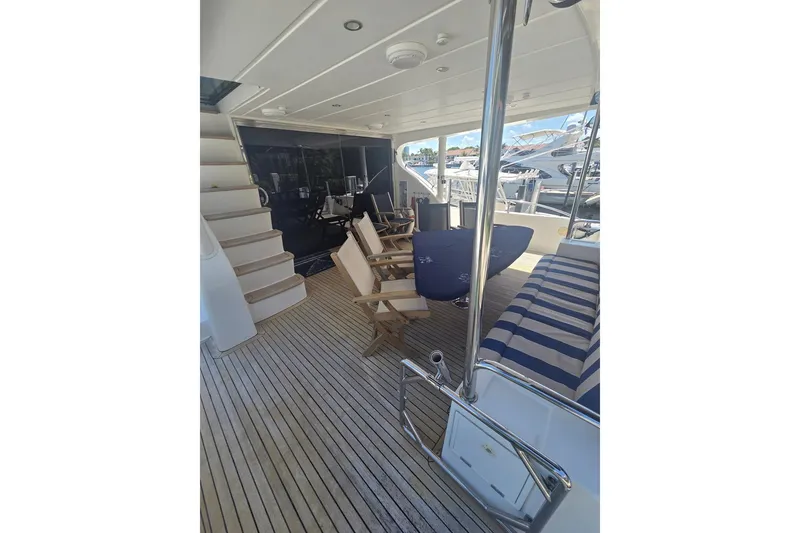 Slide: The Image of Luxurious 2009 Grand Harbour 66 Motoryacht deck with seating and staircase. - 38
