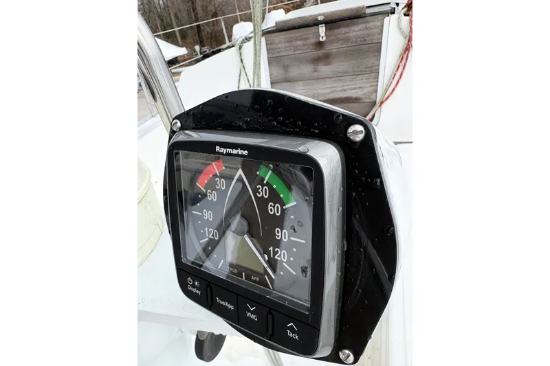 Slide: The Image of Raymarine instrument panel on 1988 Hunter 28.5 sailboat, displaying wind angle and speed. - 11