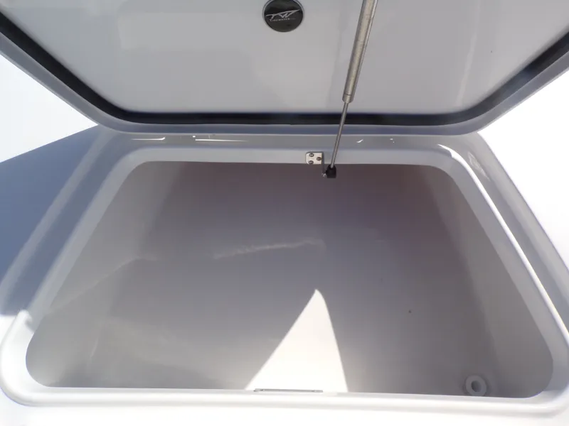 Slide: The Image of Open storage compartment in Tidewater 2110BMT boat, year 2026. - 13