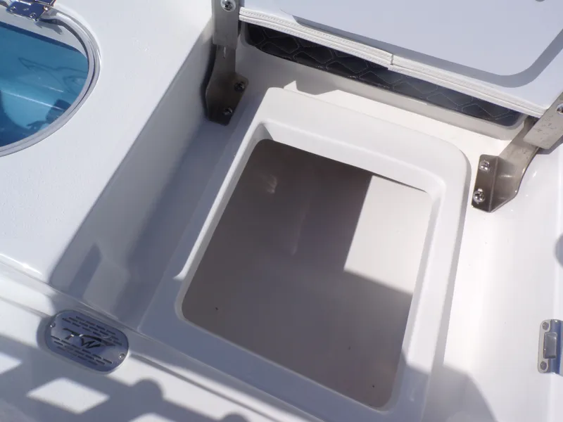 Slide: The Image of Tidewater 2110BMT 2026 boat hatch and storage compartment. - 23