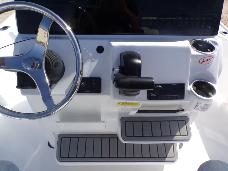 Slide: The Image of Tidewater 2110BMT 2026 helm with steering wheel and controls. - 25