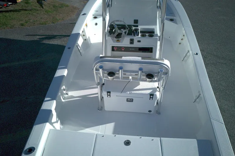 Slide: The Image of 2026 BlackJack 256 Bay boat interior with steering console and seating. - 4
