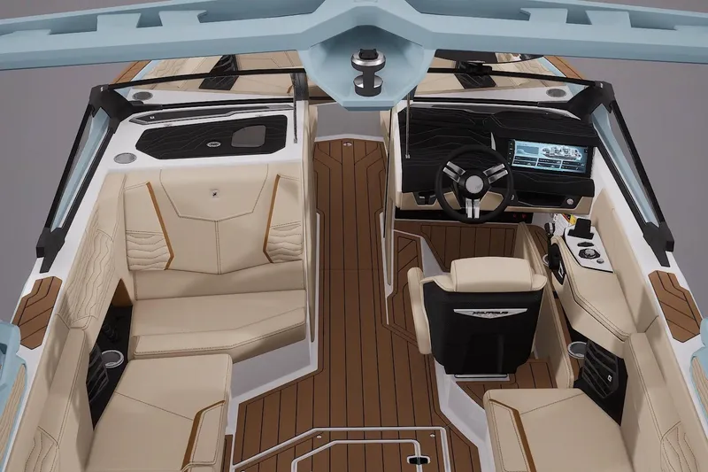 Slide: The Image of 2026 Nautique Super Air Nautique G25 interior with luxurious seating and advanced dashboard. - 3