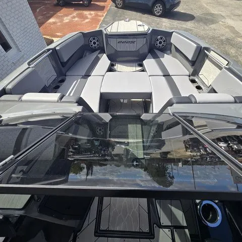 Slide: The Image of Interior view of 2025 Yamaha Boats 222XE with gray seating. - 11