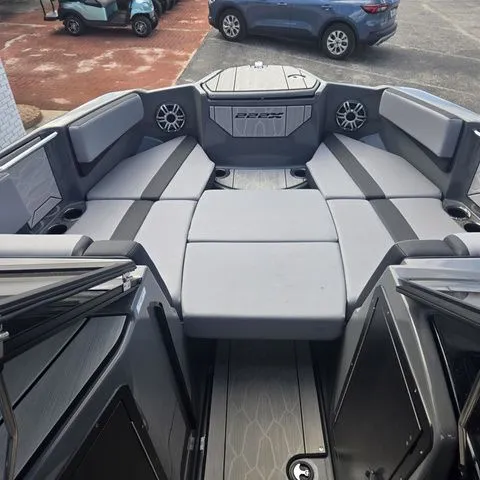 Slide: The Image of Interior of 2025 Yamaha Boats 222XE with gray upholstery. - 13