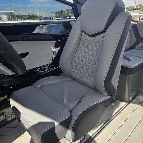 Slide: The Image of Luxurious seating in the 2025 Yamaha Boats 222XE model. - 25