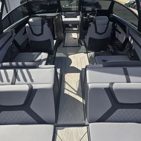 Slide: The Image of Interior of 2025 Yamaha Boats 222XE with modern seating. - 7