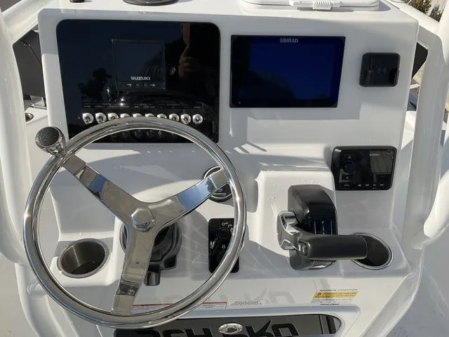 Slide: The Image of 2026 Sea Pro 230 Bay Boat helm with modern electronics. - 14