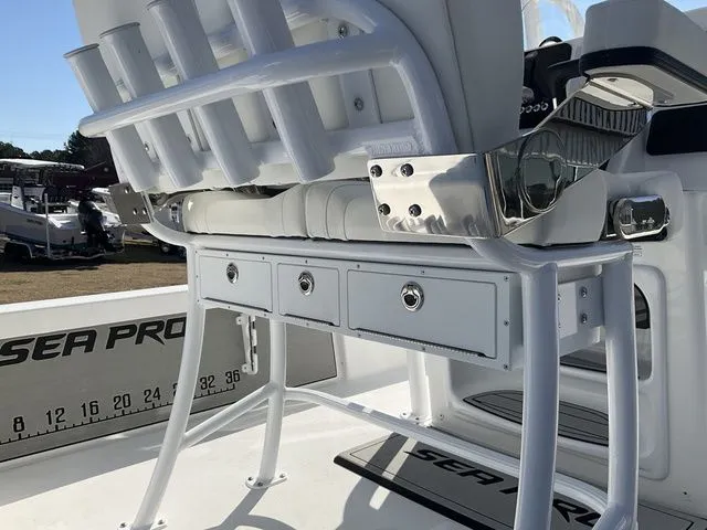 Slide: The Image of Interior view of 2026 Sea Pro 230 Bay Boat with seating and storage. - 15